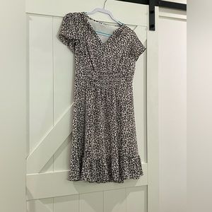 Adorable animal print short sleeve dress. Fully lined
